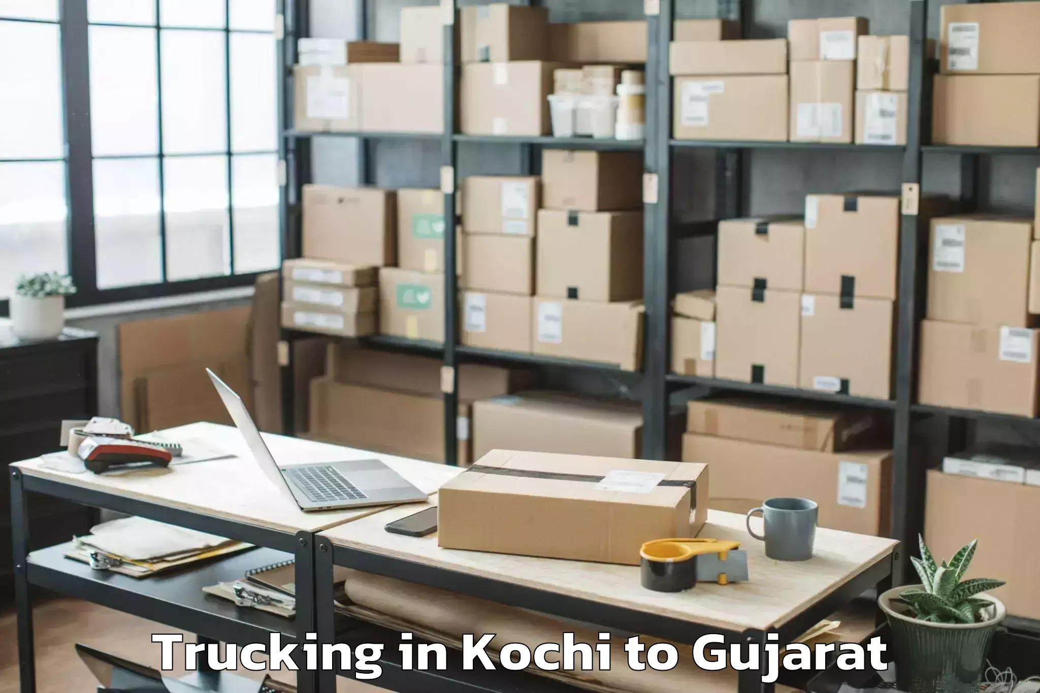 Top Kochi to Rai University Ahmedabad Trucking Available